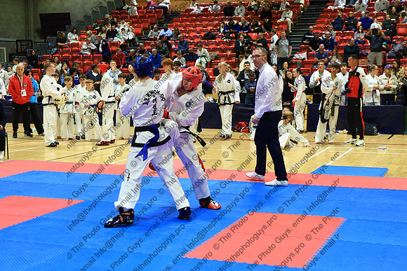 10977