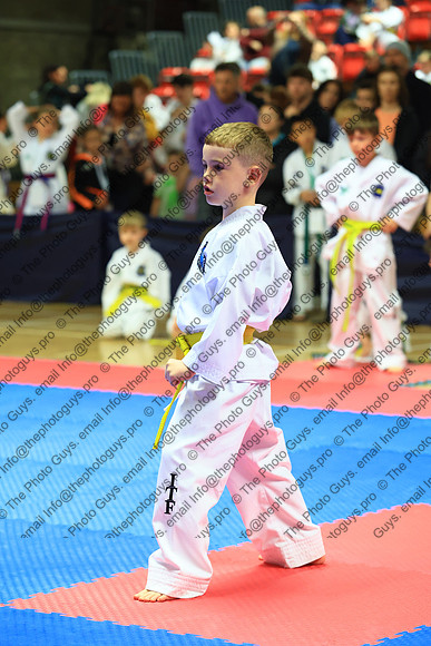 10879